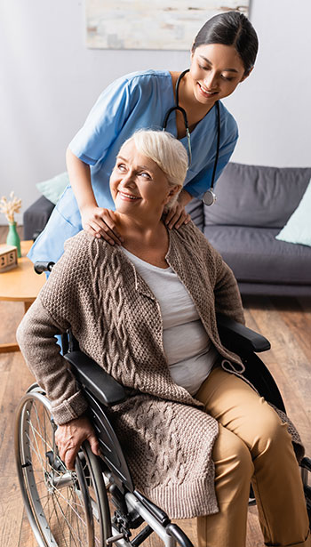 Patient in wheel chair with nurse